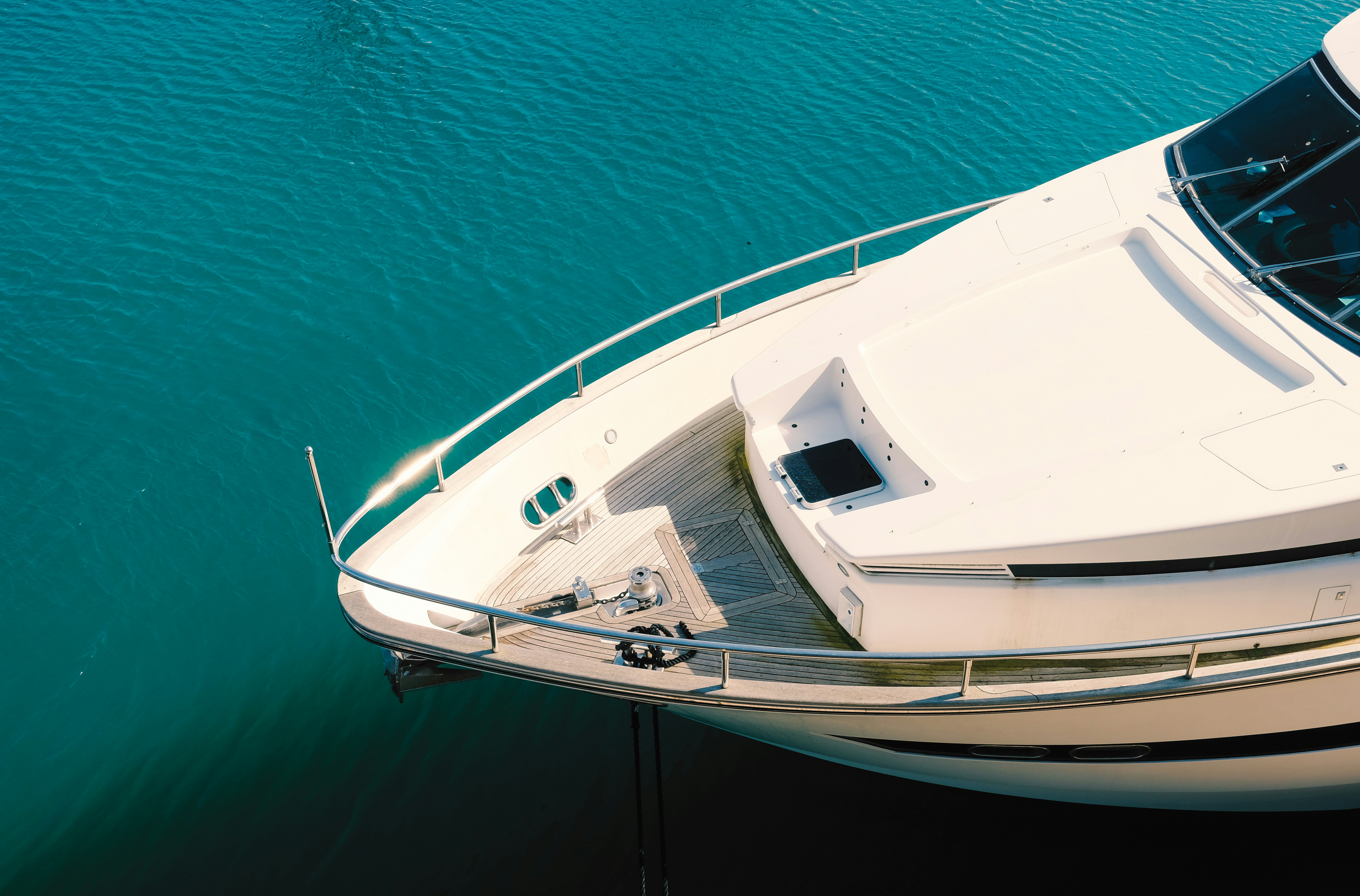 A motor yacht under way on calm open water